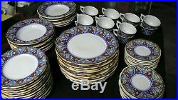64-piece Cottura pottery set with Blue, Red & Yellow Floral Pattern, Italy