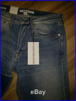 Calvin Klein Athletic Taper Italian Denim Patch Jeans Men's Size W31xL32 NWT